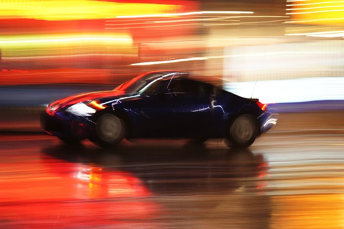 Blue speeding car